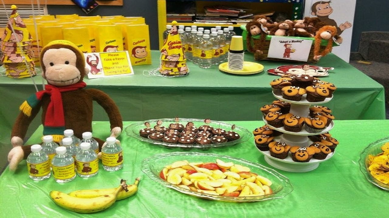Curious George Birthday Party Ideas Yummy cake table decoration
