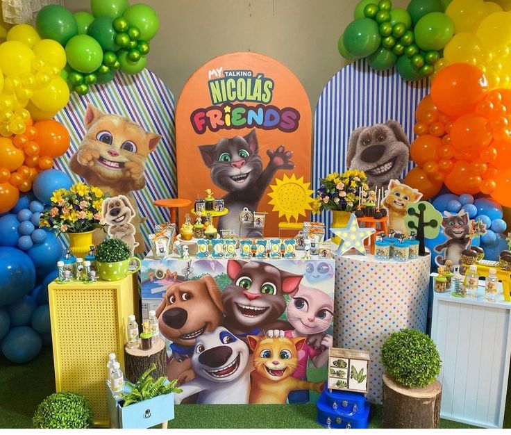 Cartoon-inspired Tom and Friends invitations surrounded by blue balloons, paw print icons, confetti bursts, and whimsical birthday party decorations