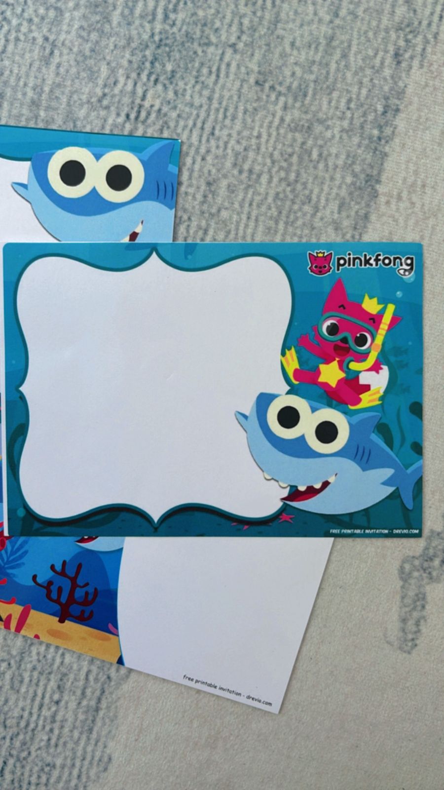 Baby Shark birthday invitations with bright ocean theme, smiling sharks, bubbles, coral, and playful underwater elements