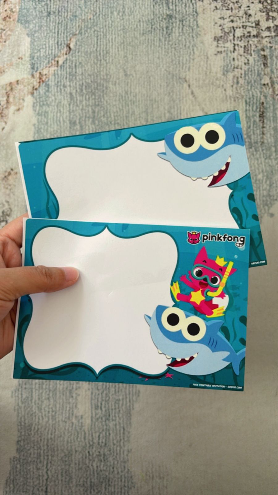 colorful Baby Shark invite design with yellow shark, blue waves, seaweed accents, and kid-friendly party details
