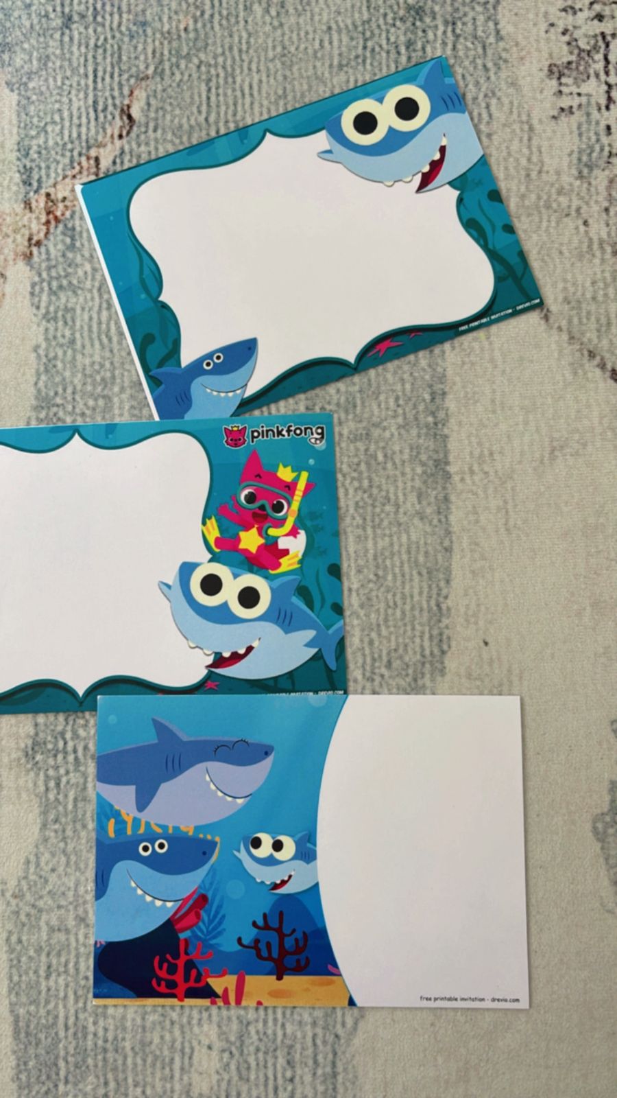 pastel Baby Shark birthday invitations featuring soft ocean colors, tiny fish, bubbles, and minimal shark characters