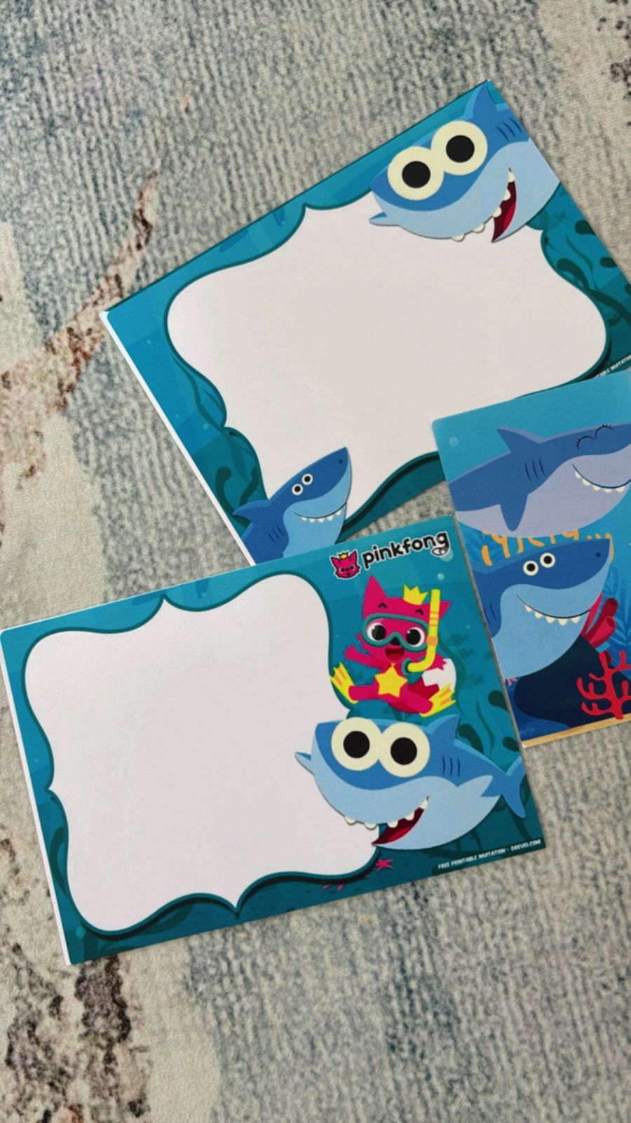 bold Baby Shark party invitation with cartoon sharks, treasure chest, coral reef, and underwater birthday vibe