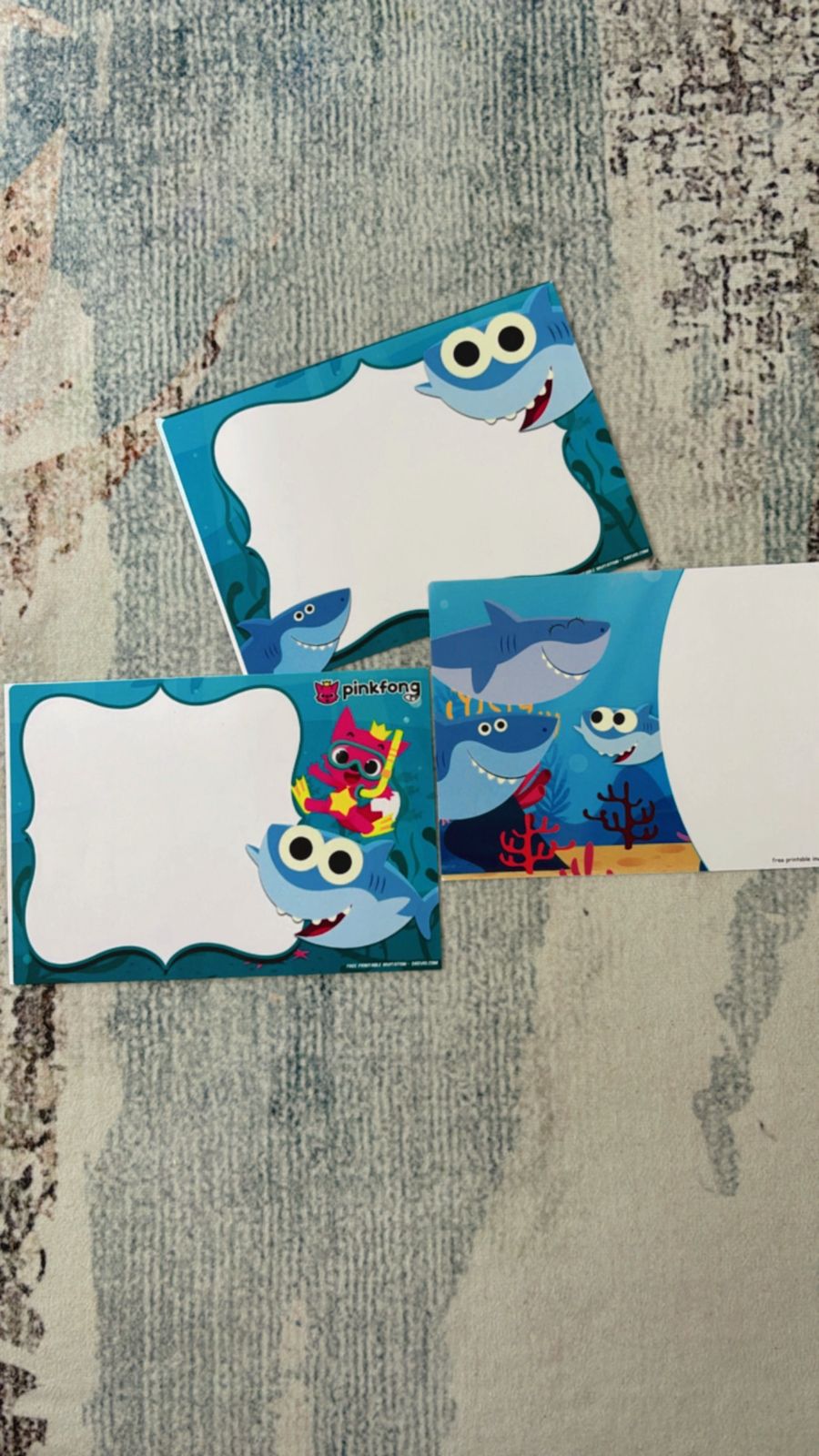 customizable Baby Shark invitation layout with ocean background, bubbles, and playful sea creatures surrounding text