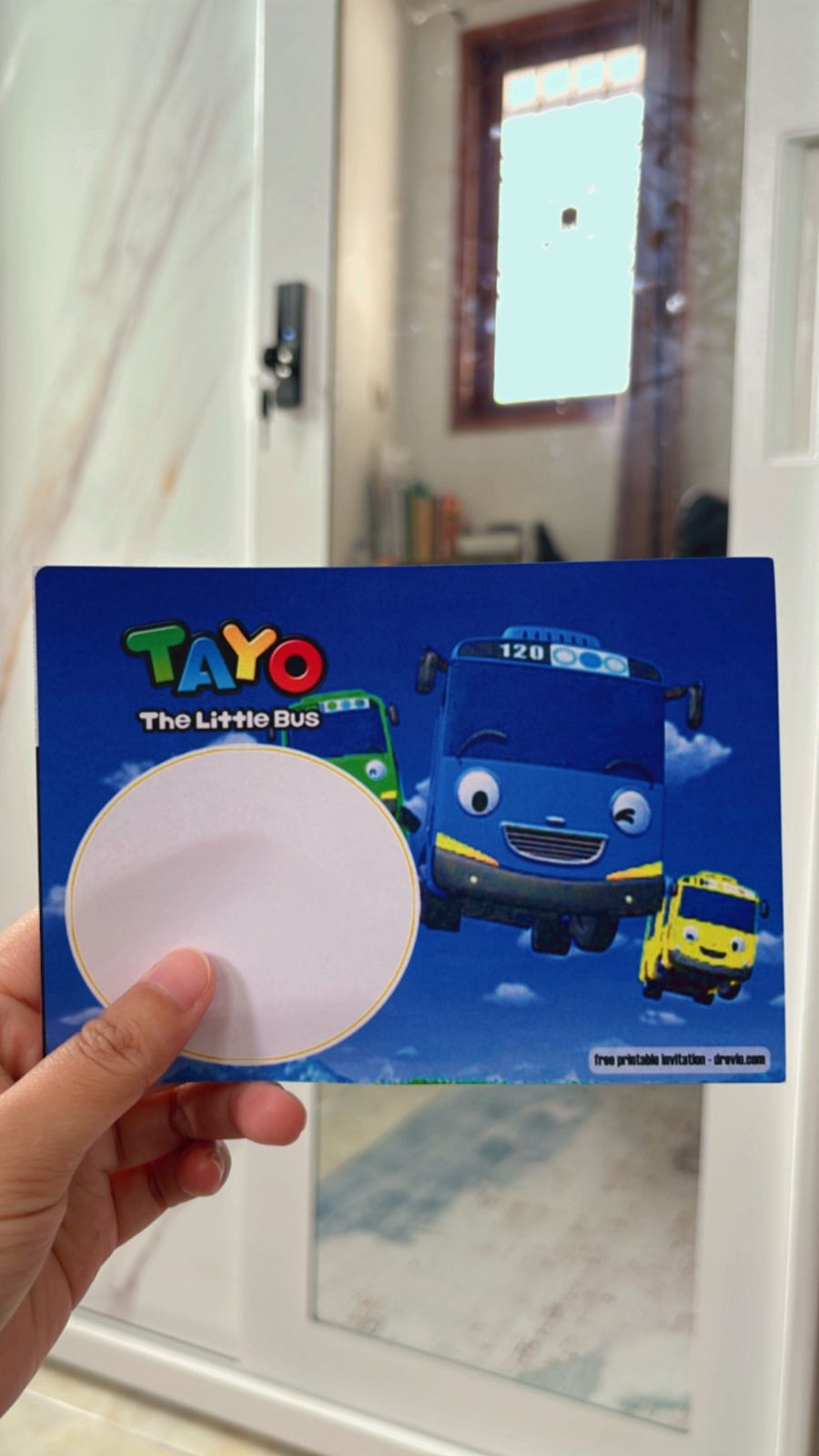 Tayo Little Bus birthday invitation with bright blue background, cartoon bus characters, road track and traffic signs theme