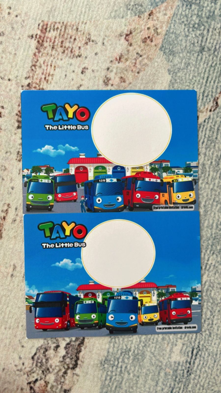 Kids party invite design featuring Tayo buses, city road layout, stoplights and playful transportation theme elements