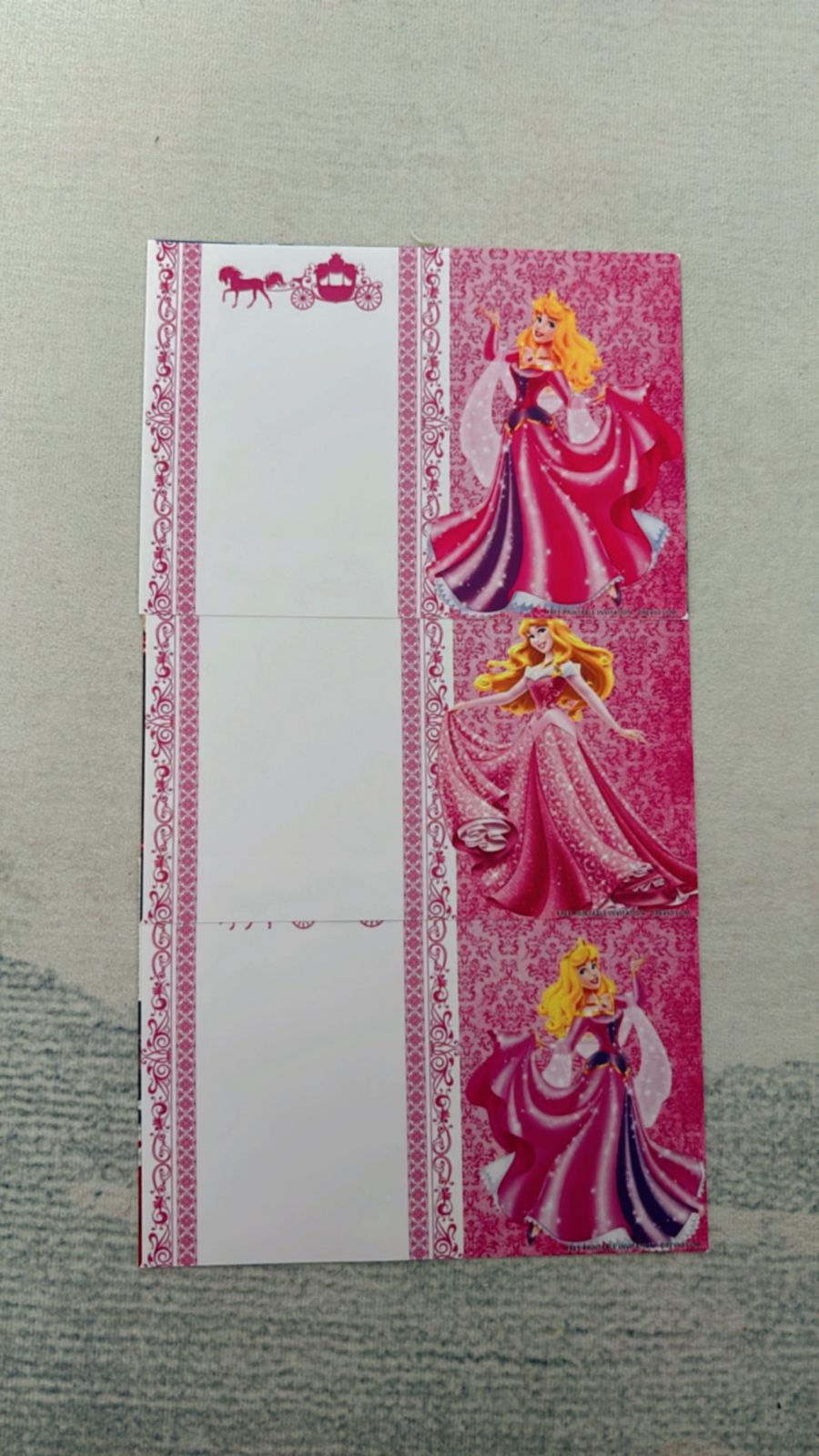 Aurora princess invite featuring castle silhouette, glowing sparkles, and pink-lilac color palette