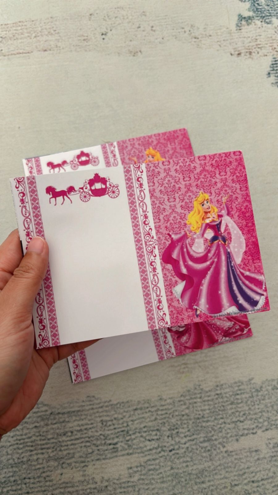 Princess Aurora birthday invitation with watercolor roses, blush pink gradient, and soft gold frame accents