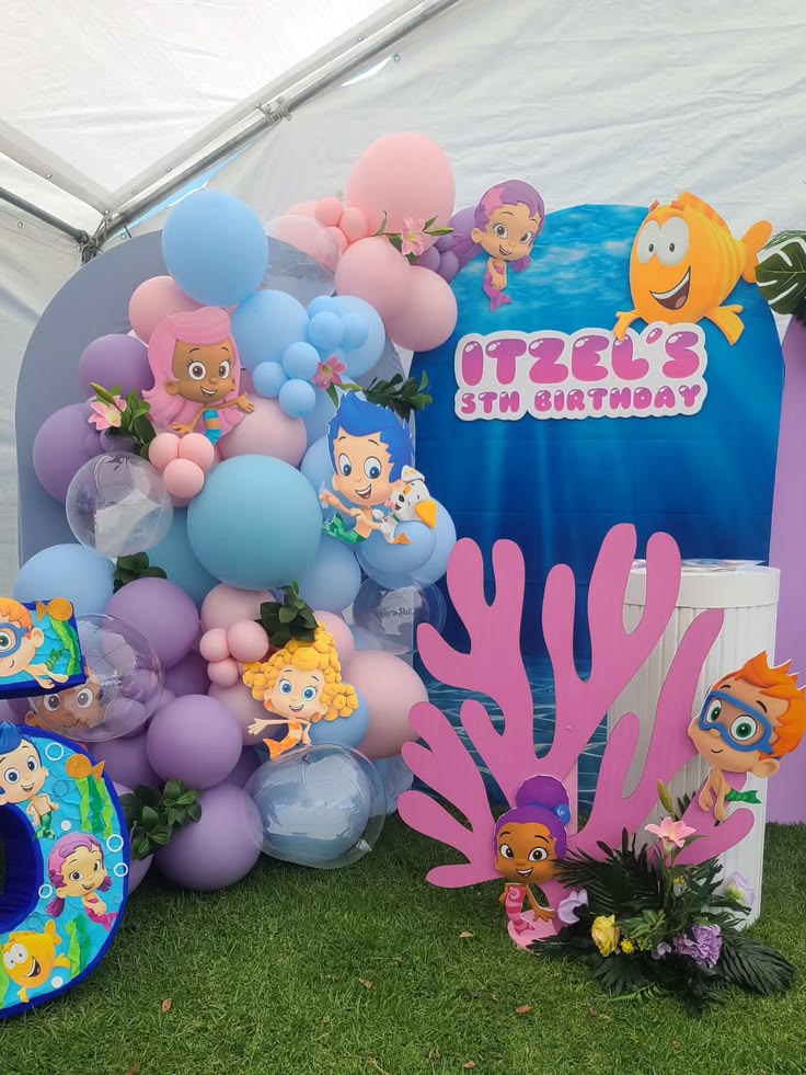 Bubble Guppies birthday invitation template featuring bright ocean waves, seaweed, shells, and smiling characters