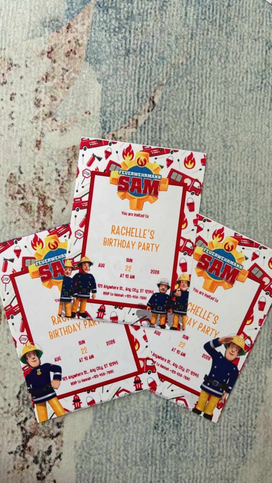 Themed Fireman Sam birthday invite mockup showing fire alarm icons, rescue badges, and bold emergency-style typography layout