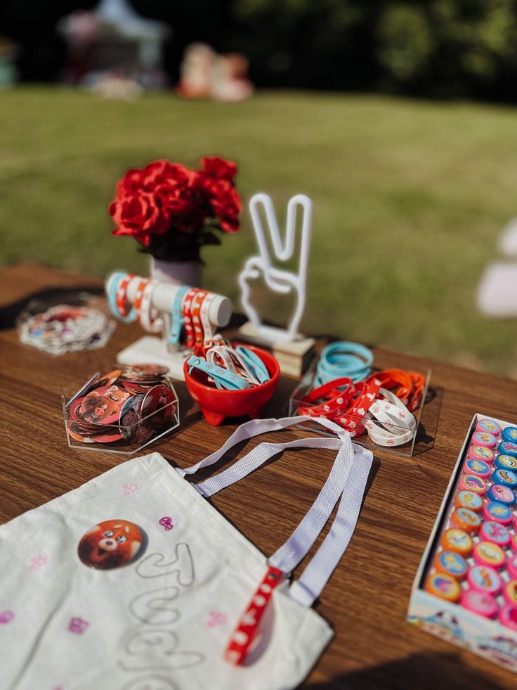 Disney Pixar Turning Red invitation with vibrant red panda, floral borders, lanterns, and playful party graphics