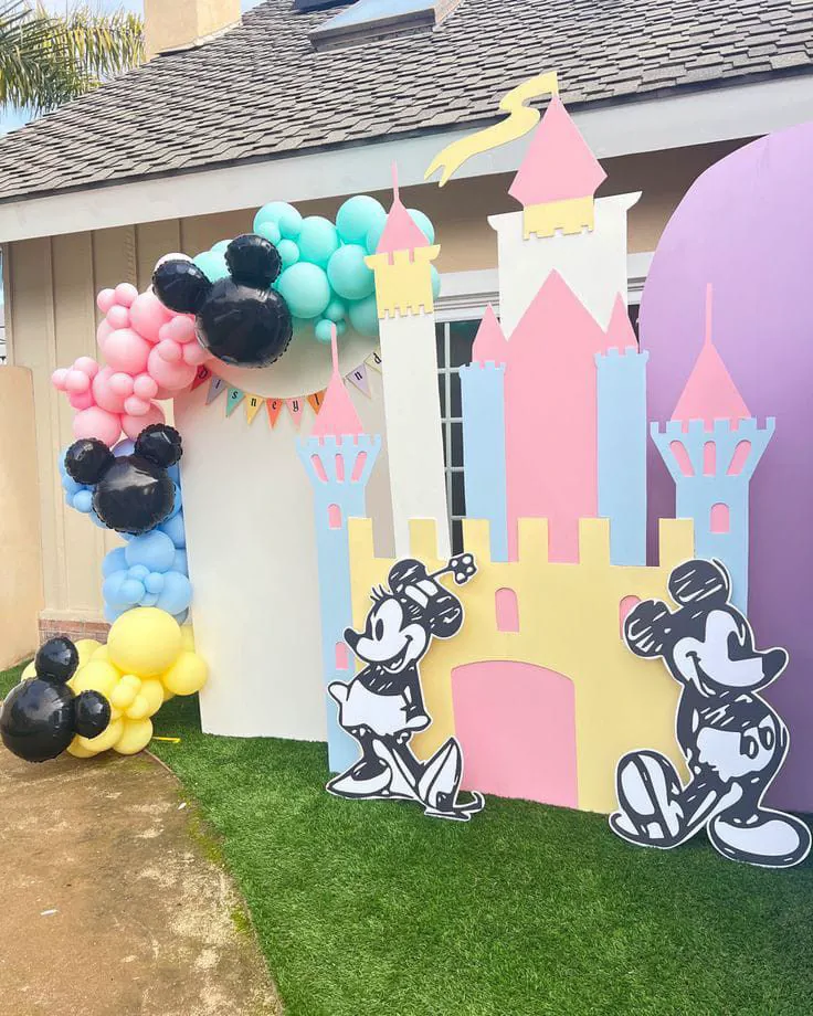 Disney Junior invitation design featuring bright primary colors, playful clouds, balloons, gifts, and sparkling stars