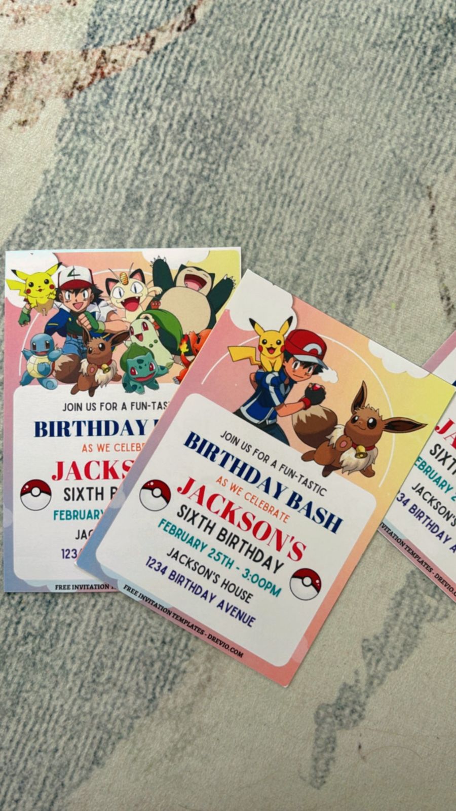 Dark battle-style Pokemon birthday invitations with glowing accents, dynamic energy lines, and bold typography