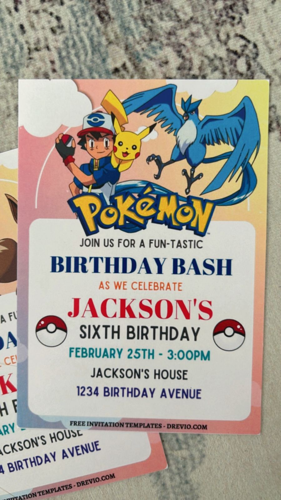 Bright electric-themed Pokemon birthday invitations with red and blue color blocks, playful battle-style graphic elements