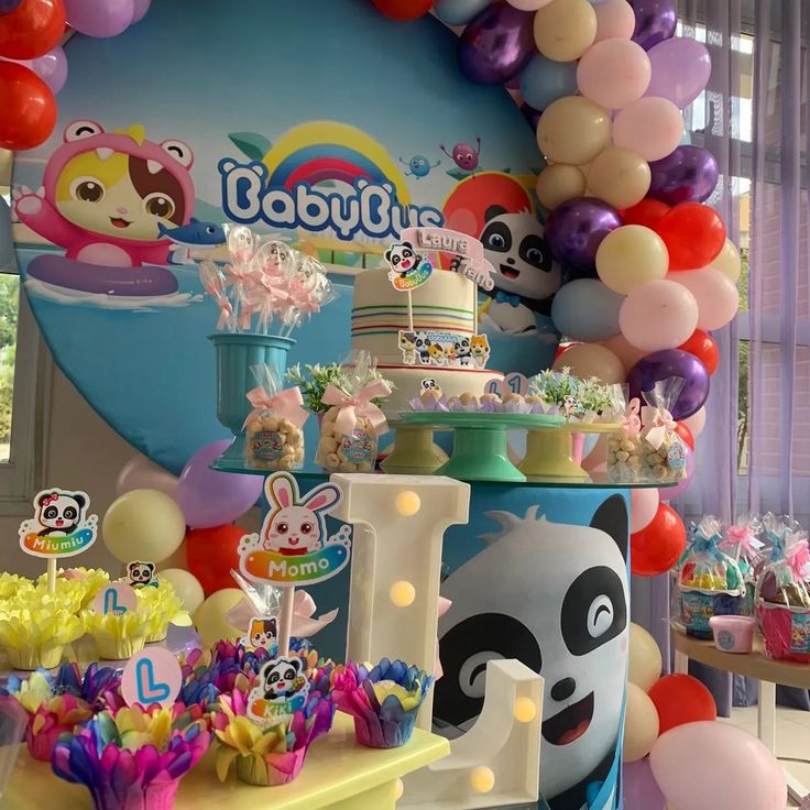 BabyBus invitations featuring Kiki, Miumiu, buses, road signs, balloons, clouds, and bright party colors