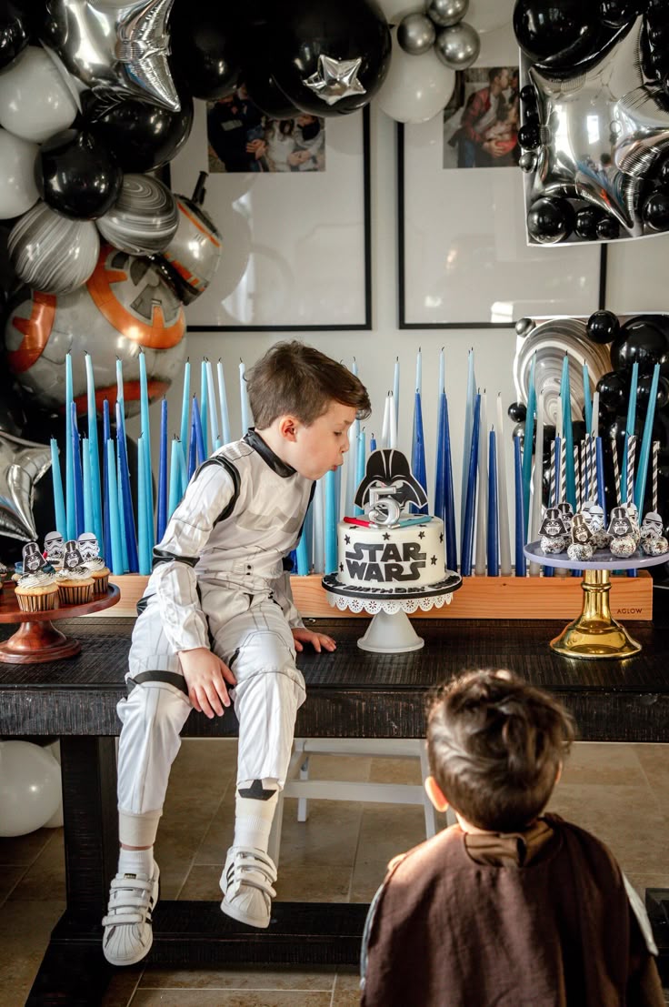Star Wars Galaxy of Heroes Canva birthday invite with heroic characters, starships, planets, and cosmic blue backdrop