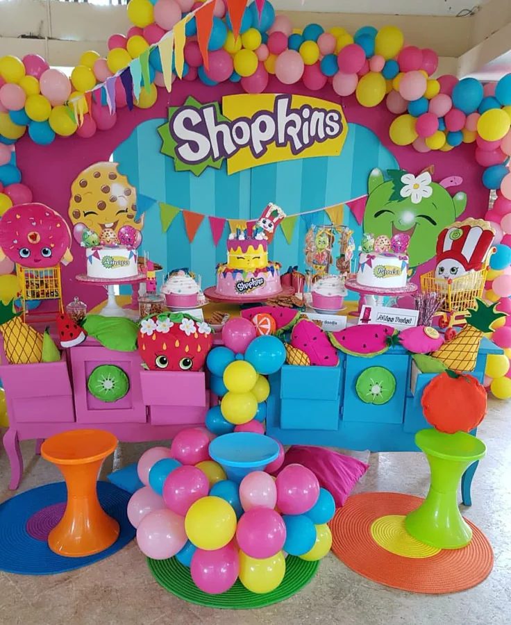 Shopkins Canva birthday invitation with candy-inspired graphics, fruit characters, confetti, and playful typography