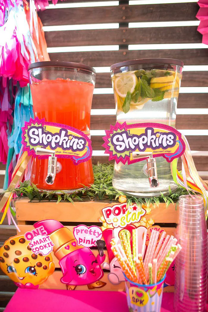 Shopkins birthday invitation with colorful grocery characters, cupcakes, fruit friends, and pastel party decorations