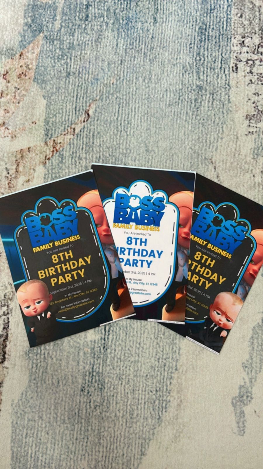 Canva-designed kids party invite showing Boss Baby executive theme, circular badge-style name highlight, and subtle gold trim details