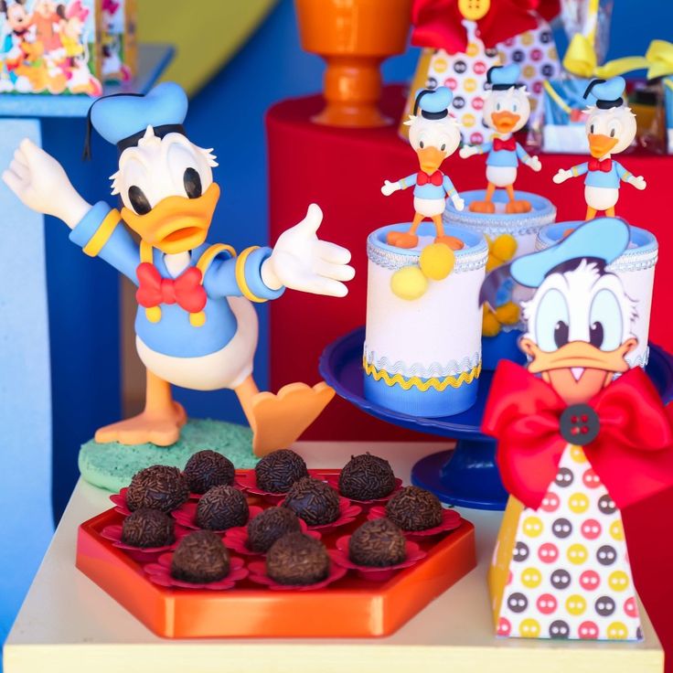 Donald Duck birthday party invitation featuring classic Disney colors, nautical accents, and festive confetti