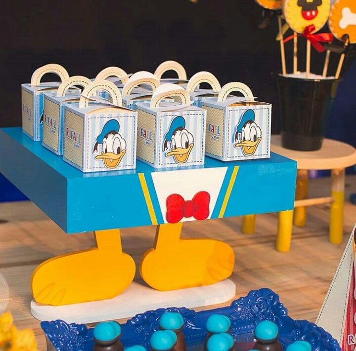 Donald Duck invitation template featuring blue and yellow party theme with sailor elements and bunting
