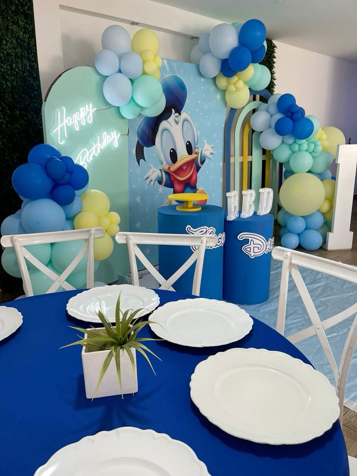 Disney Donald Duck birthday invitation surrounded by anchors, lifebuoys, stars, and colorful streamers