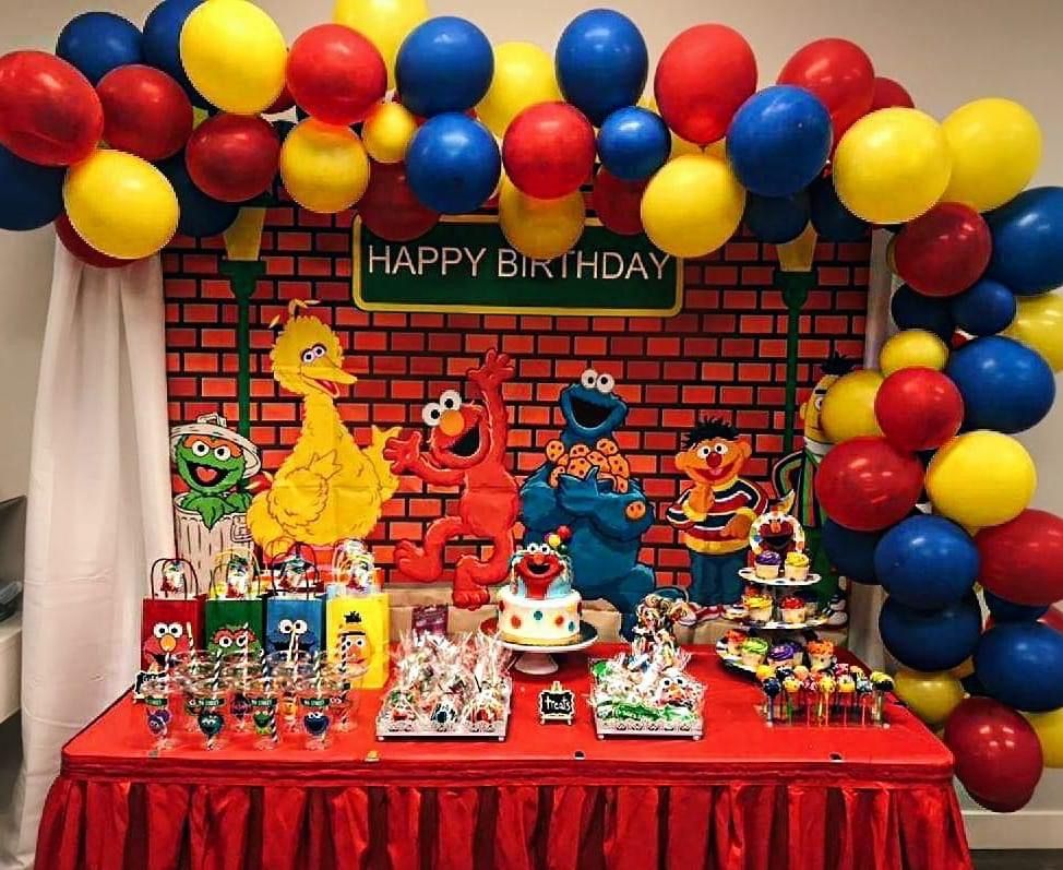 Sesame Street Birthday Party decor with Brick wall backdrop, and cutouts