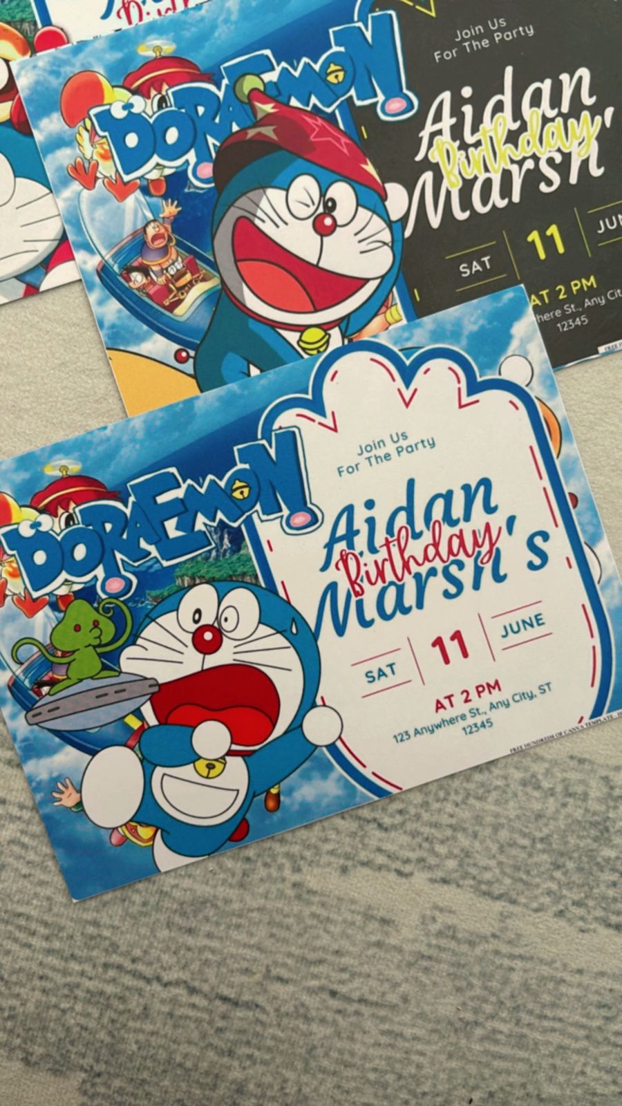 Minimalist Doraemon invitation with clean layout, small character icon, and simple blue-white theme