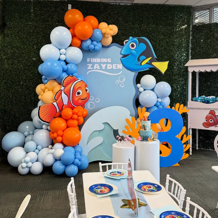 Editable Finding Nemo birthday invitation featuring Nemo, sea turtles, jellyfish, coral, and tropical fish