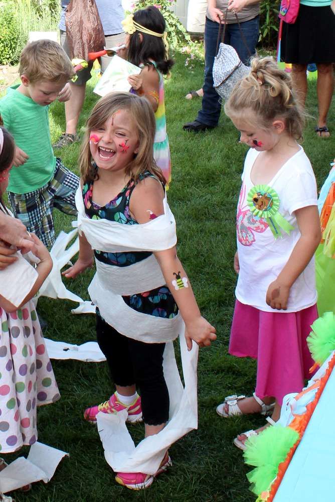 Mystery-themed birthday invitation featuring Scooby-Doo characters, clue cards, spider webs, and bats
