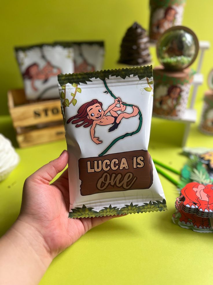 Tarzan birthday invite featuring rainforest trees, tropical flowers, and adventurous jungle scenery