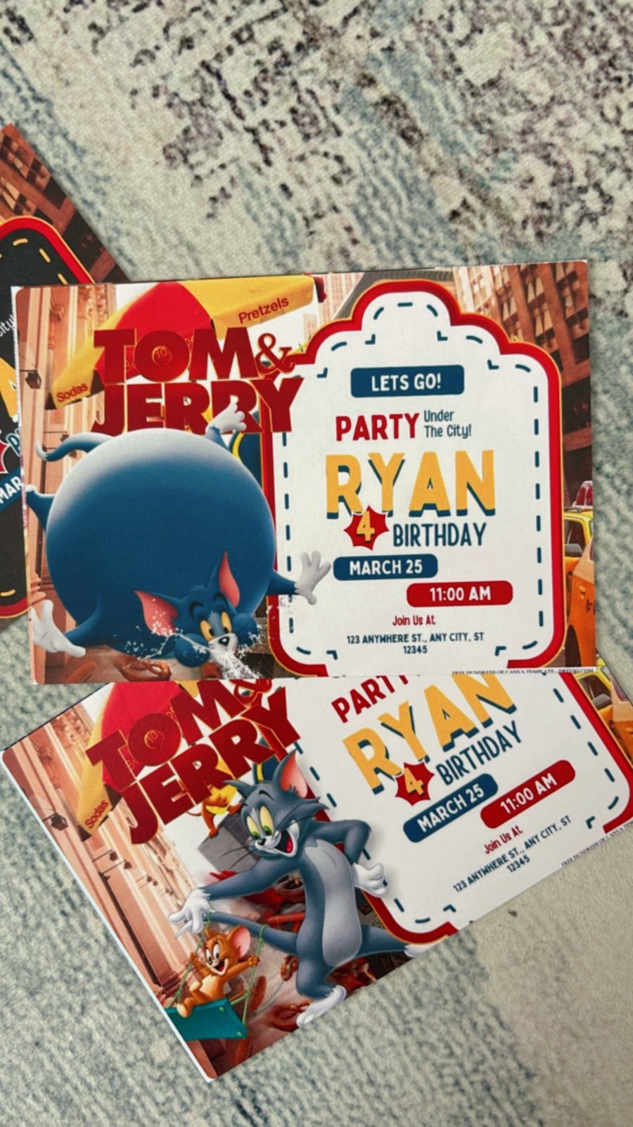 Playful birthday invite with Tom reaching for Jerry, scattered cheese details, and comic-style effects