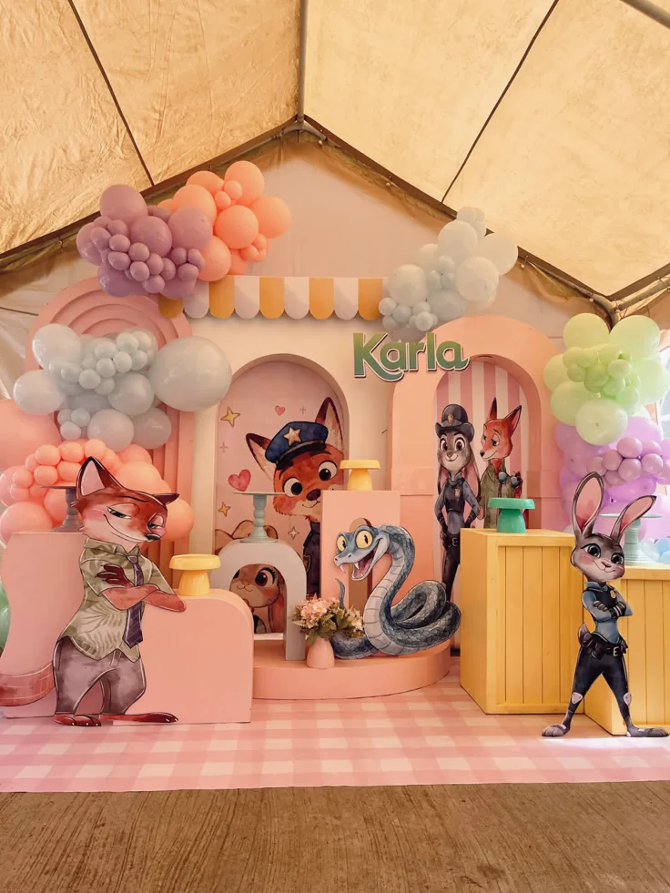 Zootopia birthday invitation Canva template featuring Judy Hopps-inspired police badge details, carrot icons, city skyline, and playful animal elements