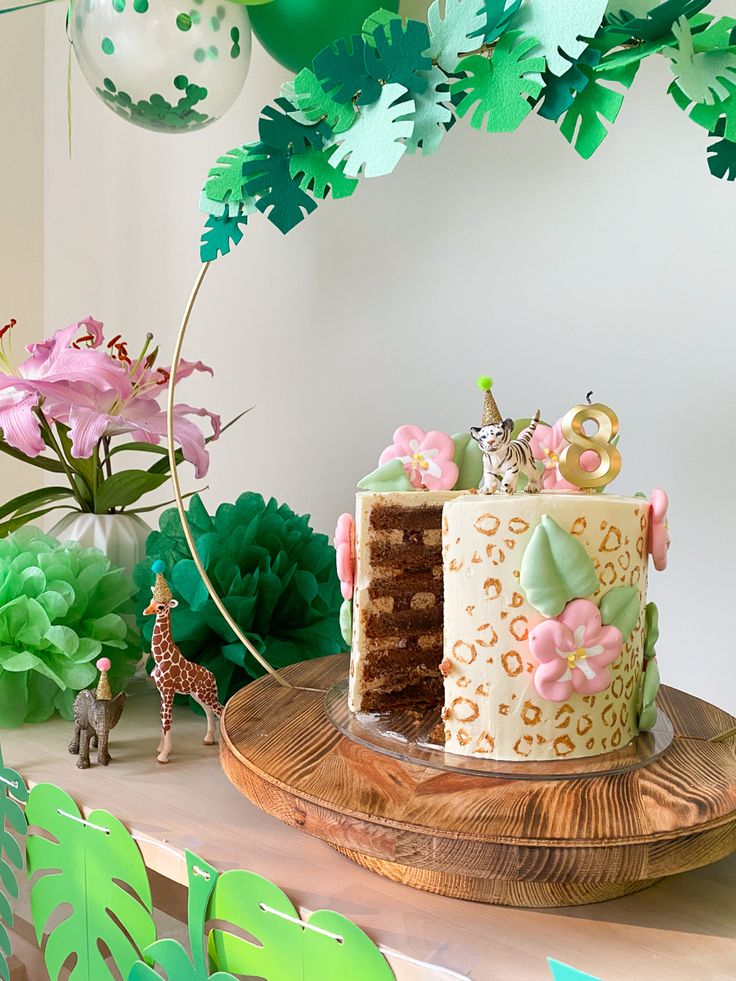 Jungle Book Invitation featuring Mowgli and Baloo surrounded by watercolor jungle leaves, tropical vines, and storybook illustrations