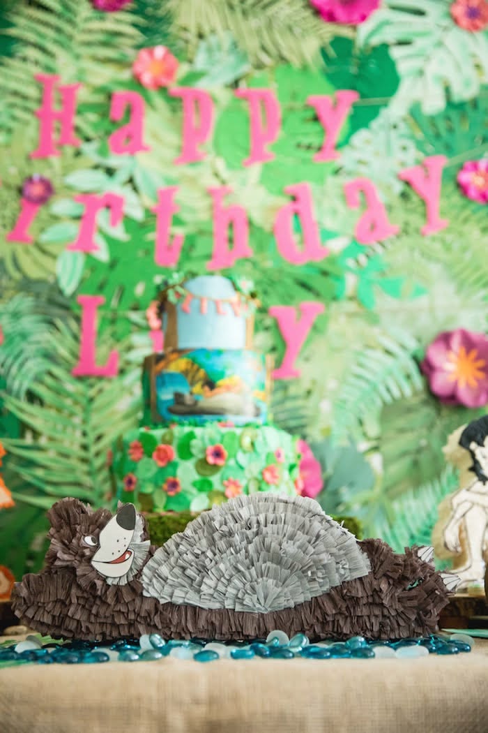 Watercolor Jungle Book birthday invitation design with tropical foliage, animal characters, earthy green tones, and playful typography