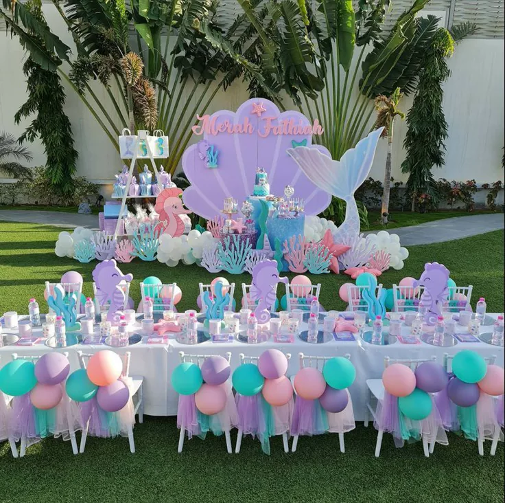 Ariel birthday invitation decorated with pastel coral reef, jellyfish, starfish, pearls, and sea horses