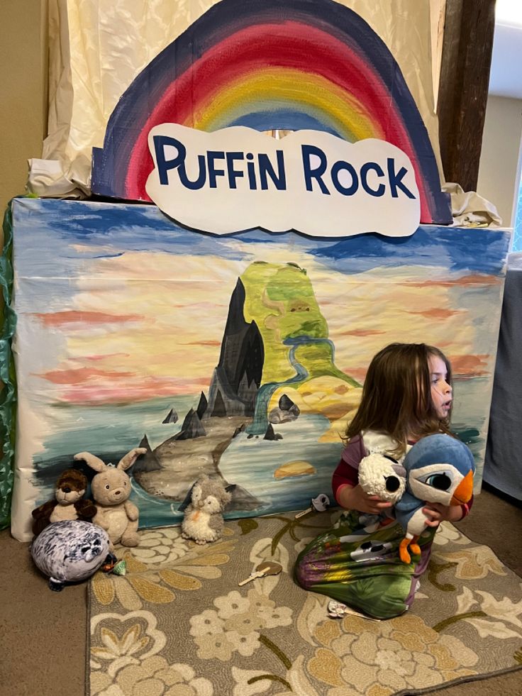 Cute Puffin Rock invitation design surrounded by mushrooms, butterflies, shells, watercolor leaves, and friendly island birds