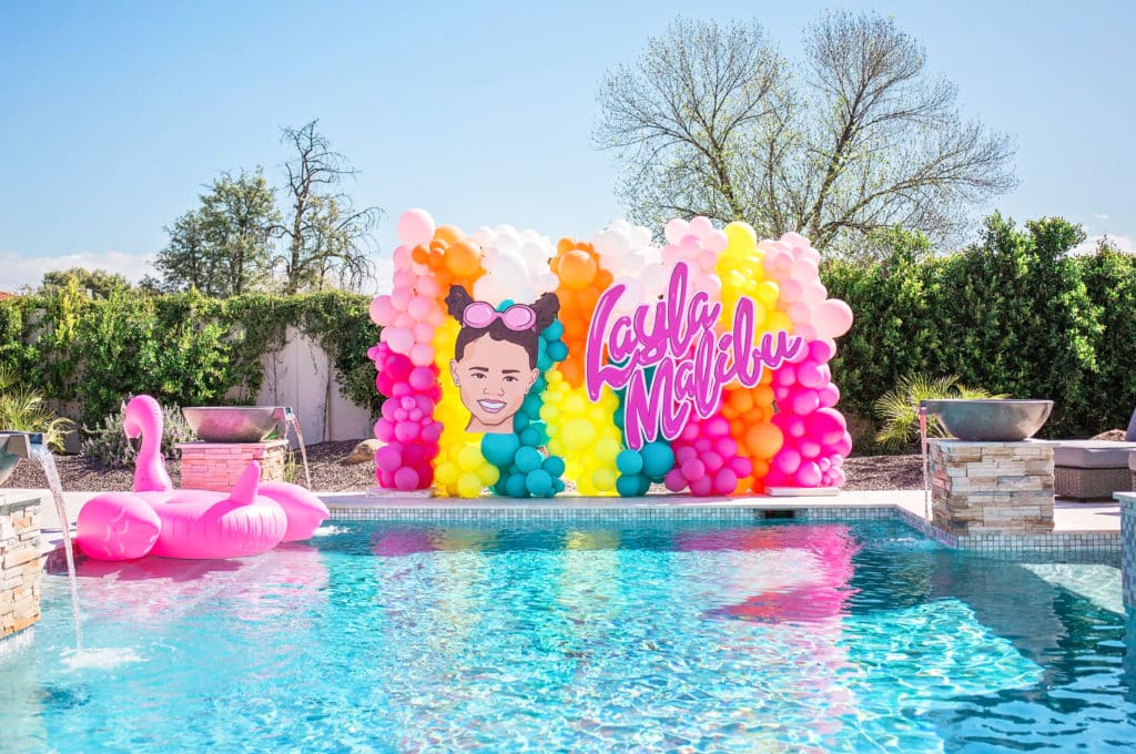 Barbie Pool Party With Colorful Balloon Arch and streamers