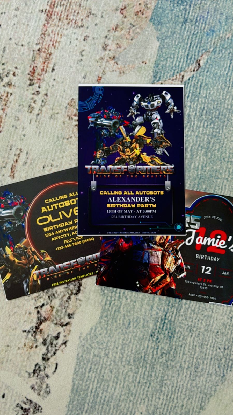 Transformer birthday invitation card showing dual Autobot and Decepticon symbols, each circled for emphasis, with metallic textures and action-themed fonts