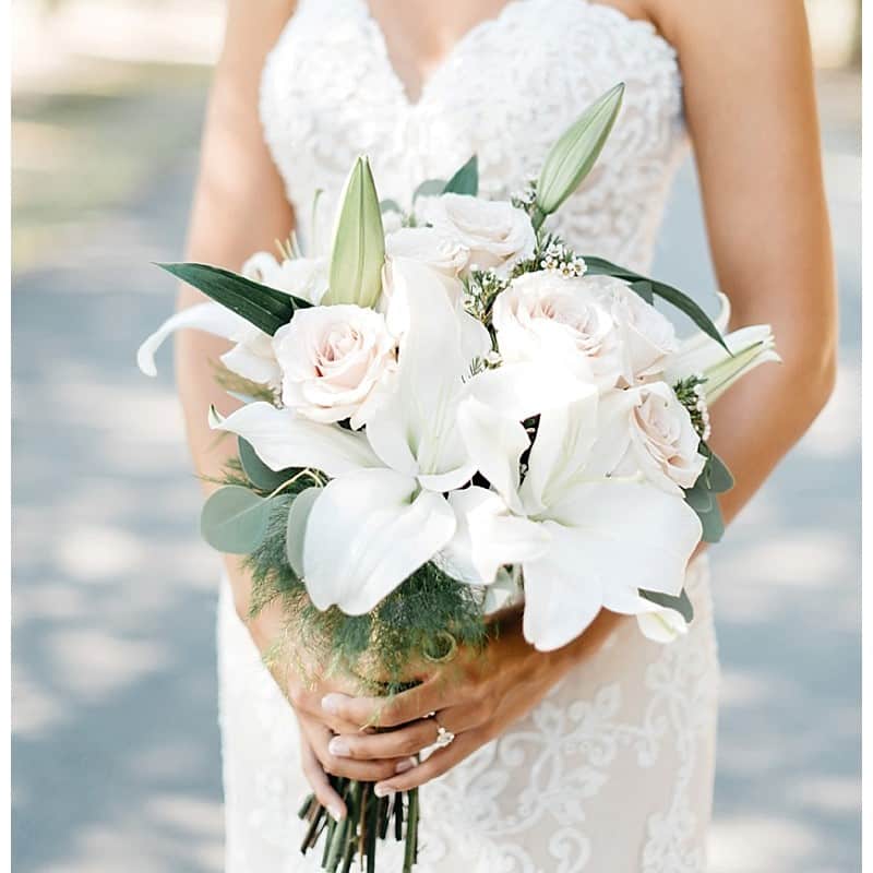 Pristine white Lily wedding bouquet