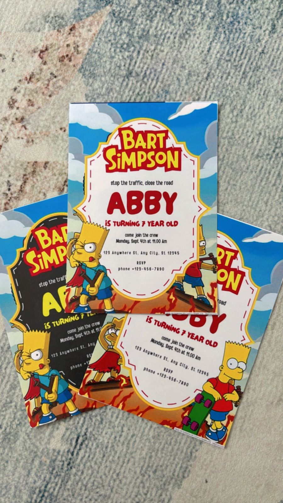 Bold Simpsons invite design featuring cartoon-style fonts, scattered donuts, and playful chaotic layout