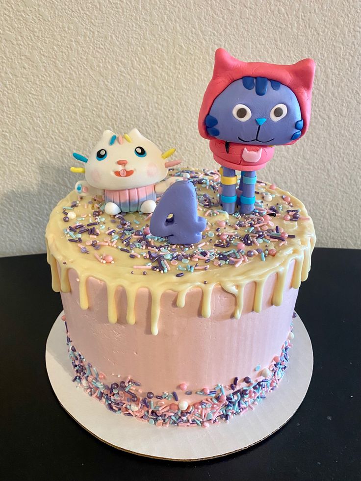 Pink Frosting Gabby’s Dollhouse Cake with Dripping Icing and Cake Topper (DJ Catnip, Cakey and Catrat)