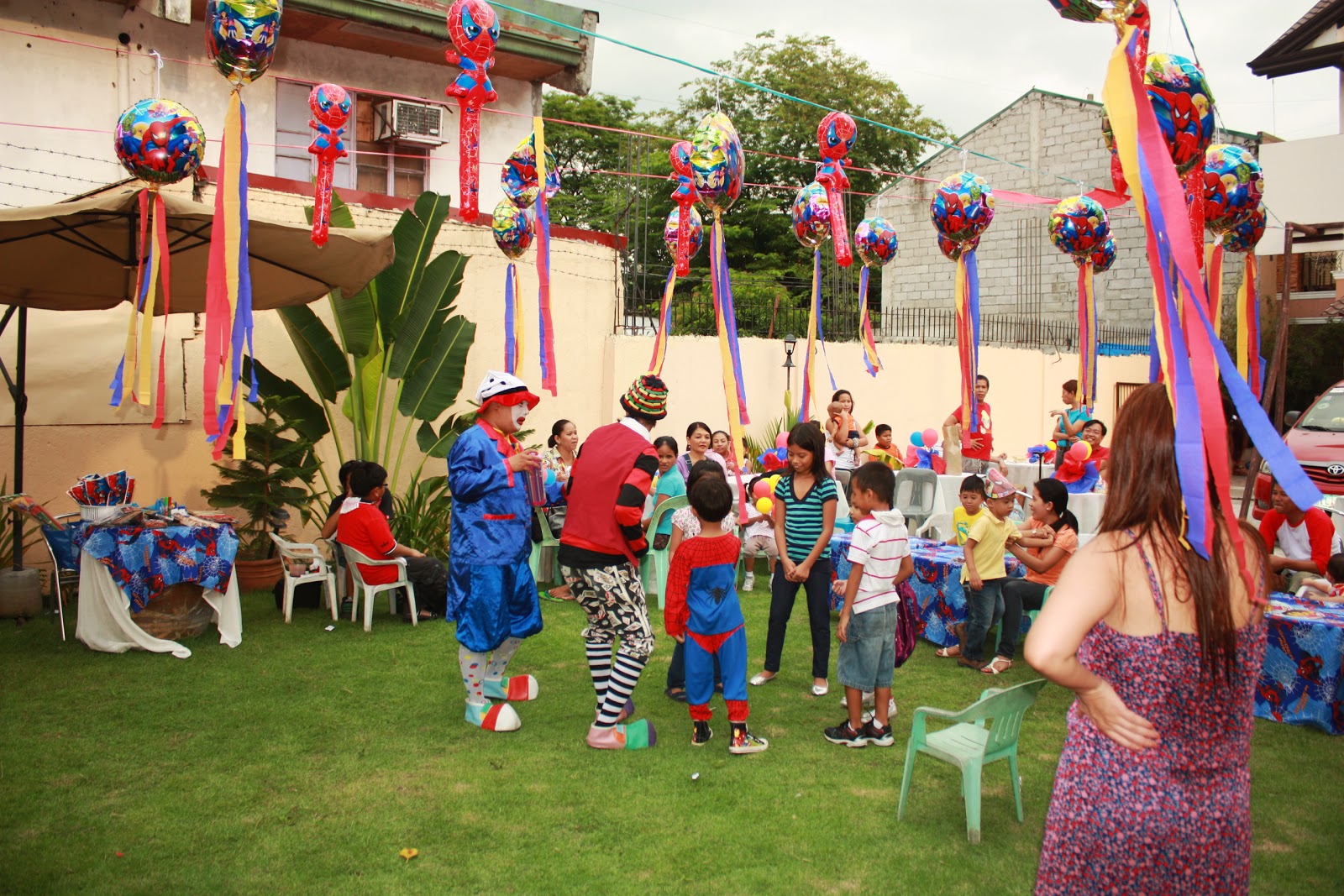 Happy Kids Playing at their friend's Spiderman themed Birthday Party