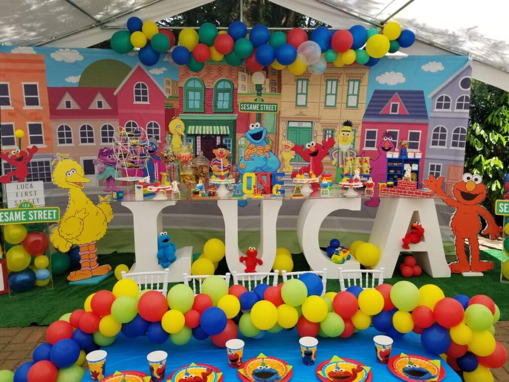 Colorful Sesame Street Birthday Party Decor in the backyard