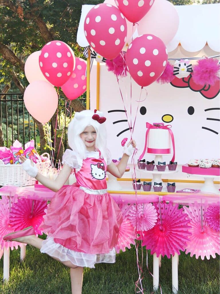 Adorable Little Girl in pink tutu dress at her Hello Kitty Birthday Party