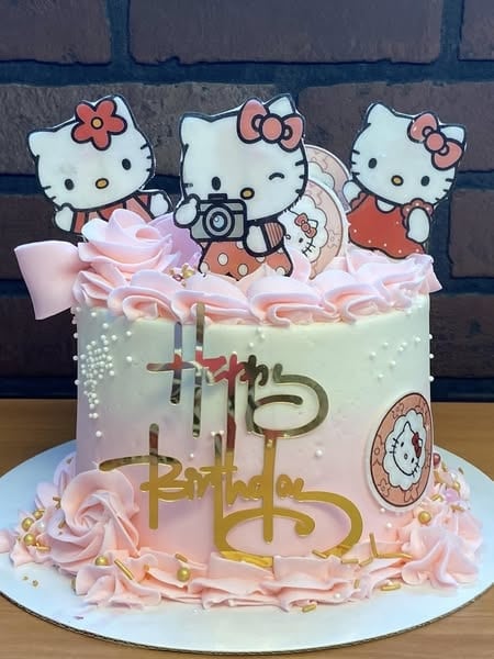 Adorable Pink and White Buttercream Hello Kitty Birthday Cake