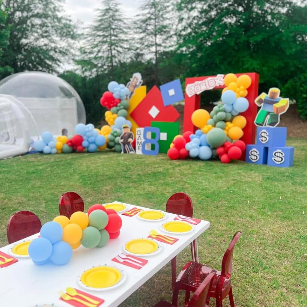 Backyard Roblox Birthday Party with Colorful Balloon decorations