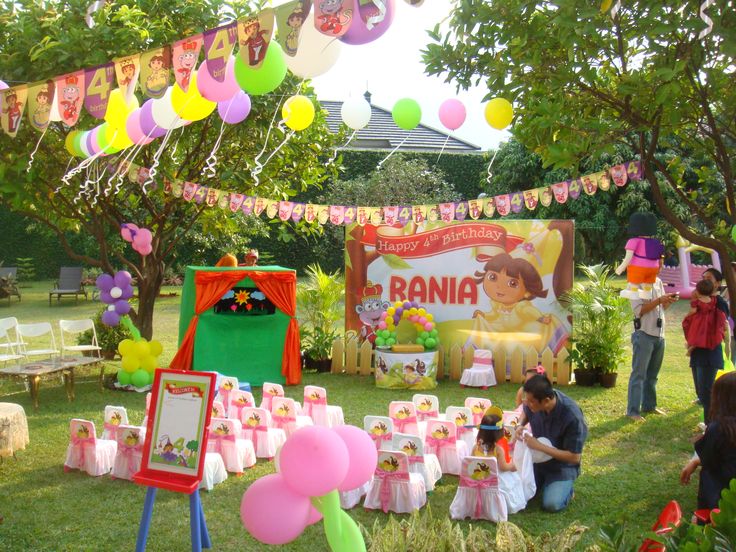 Backyard Dora the Explorer Birthday Party with colorful bunting flags