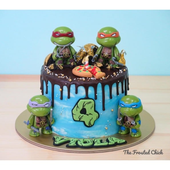 Awesome TMNT Ninja Turtles Round Birthday Cake with Dripping icing and awesome Michael Angelo, Donatello, Leonardo and Raphael Plastic Figurines