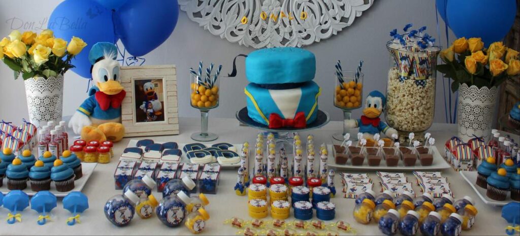 Donald Duck Inspired Birthday party dessert table setup