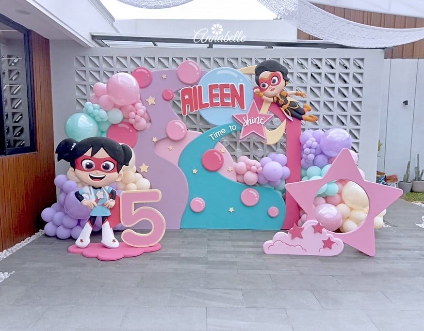 Adorable pink themed Starbeam Birthday Party backdro with balloon and Styrofoam Arch backdrop